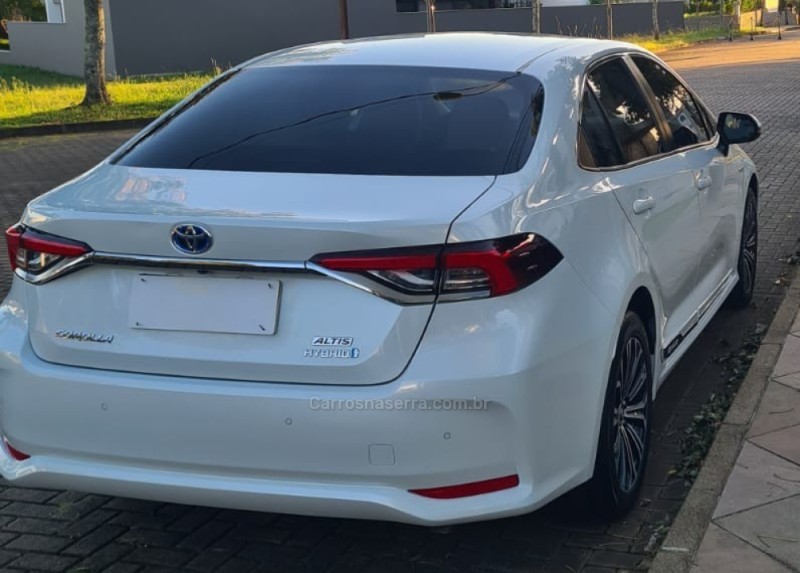 COROLLA 1.8 ALTIS PREMIUM 16V HÍBRIDO 4P AUTOMÁTICO - 2023 - BENTO GONçALVES