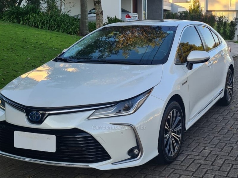 corolla 1.8 altis premium 16v hibrido 4p automatico 2023 bento goncalves