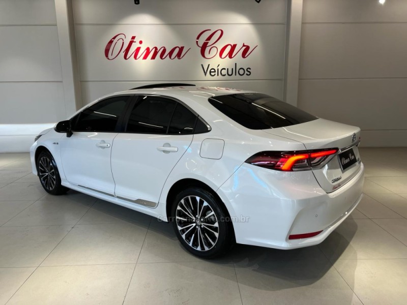 COROLLA 1.8 ALTIS PREMIUM 16V HÍBRIDO 4P AUTOMÁTICO - 2024 - FLORES DA CUNHA