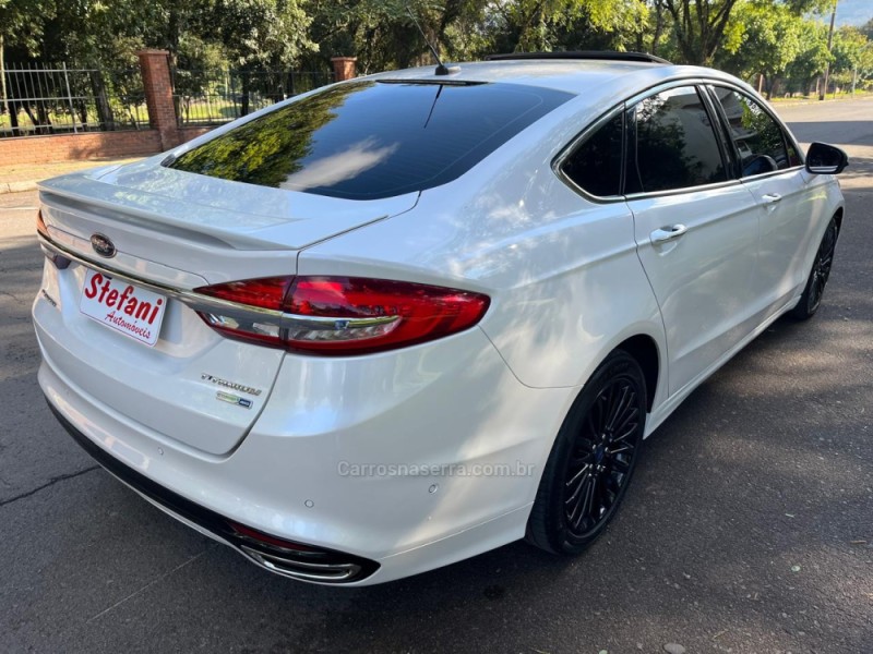 FUSION 2.0 TITANIUM GTDI ECOBOOST AWD AUTOMÁTICO - 2018 - FELIZ
