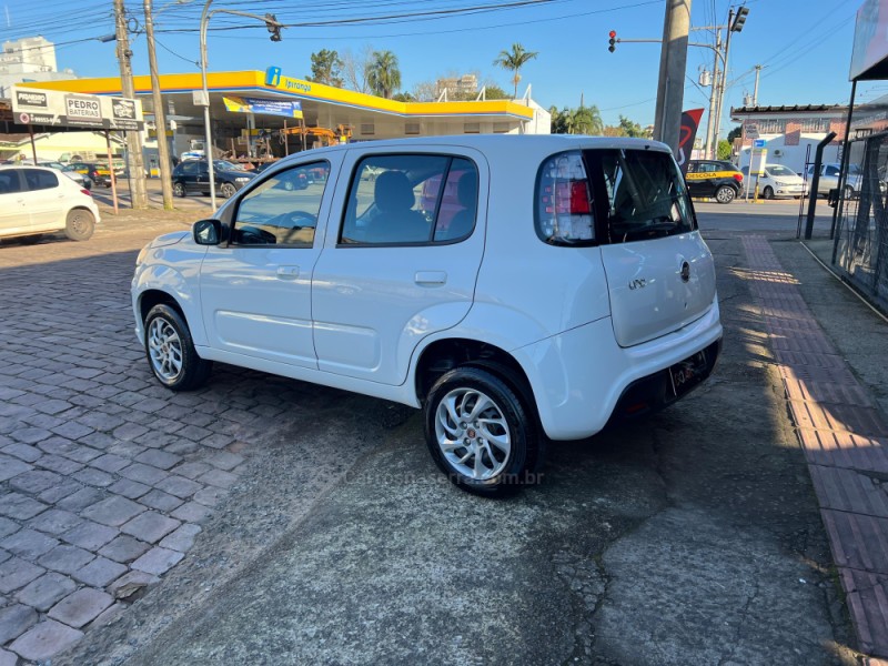 UNO 1.0 EVO ATTRACTIVE 8V FLEX 4P MANUAL - 2021 - VENâNCIO AIRES