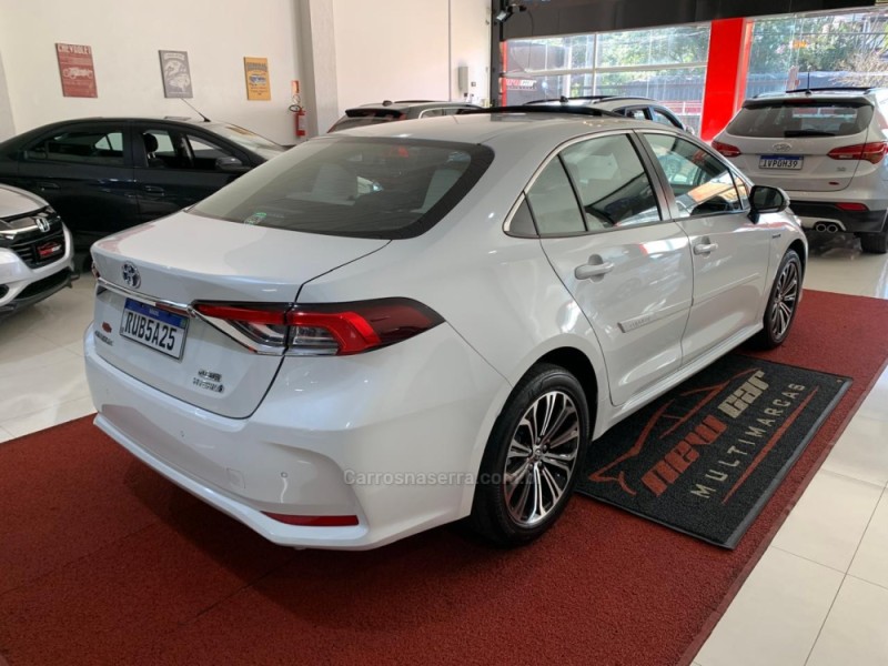 COROLLA 1.8 ALTIS PREMIUM 16V HÍBRIDO 4P AUTOMÁTICO - 2023 - NOVO HAMBURGO