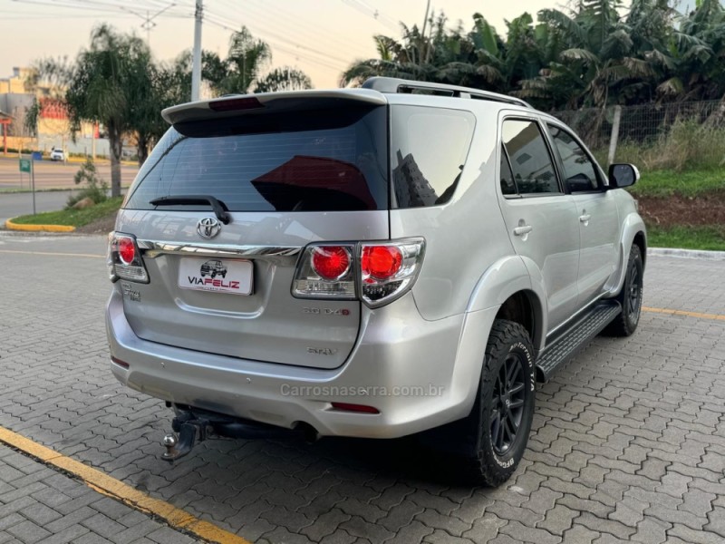 HILUX SW4 3.0 SRV 4X4 7 LUGARES 16V TURBO INTERCOOLER DIESEL 4P AUTOMÁTICO - 2013 - FELIZ