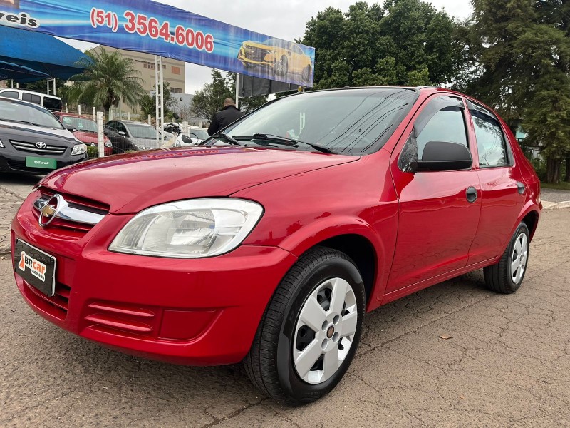 PRISMA 1.0 MPFI JOY 8V FLEX 4P MANUAL - 2010 - DOIS IRMãOS