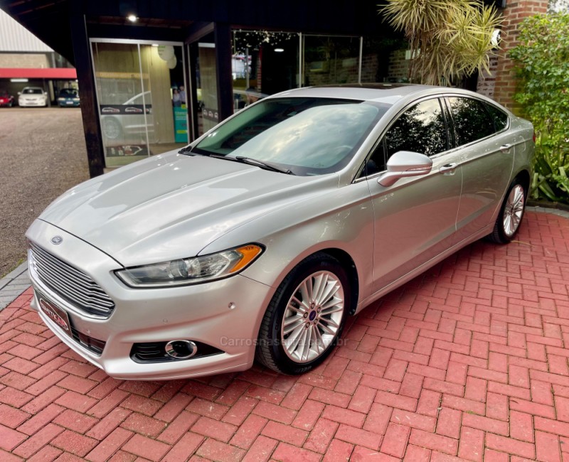 FUSION 2.0 TITANIUM AWD 16V GASOLINA 4P AUTOMÁTICO - 2013 - ROLANTE