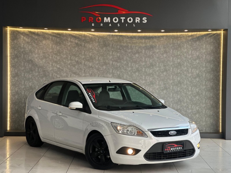 FOCUS 1.6 8V FLEX 4P MANUAL - 2011 - PORTãO