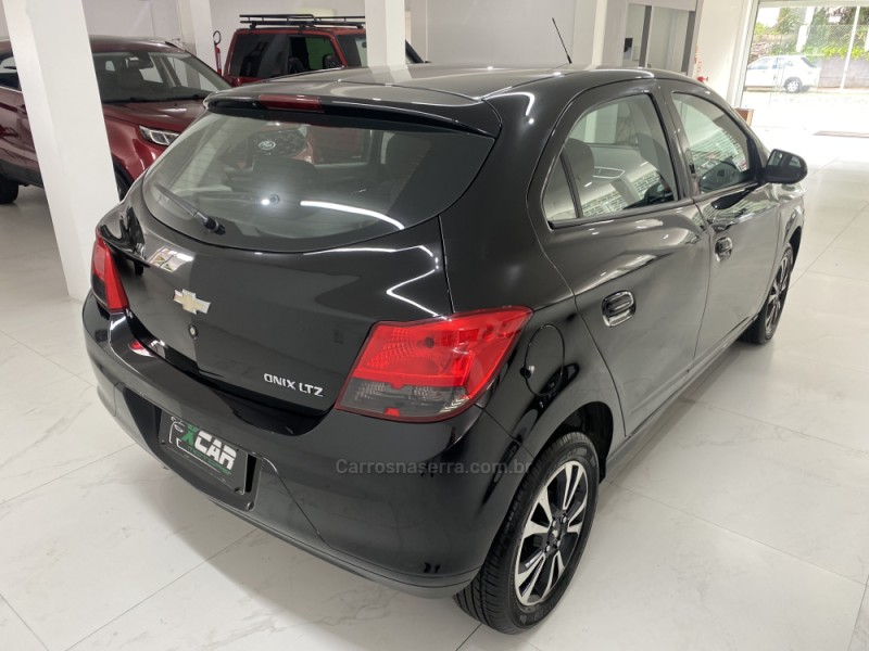 ONIX 1.4 MPFI ACTIV 8V FLEX 4P MANUAL - 2014 - BENTO GONçALVES