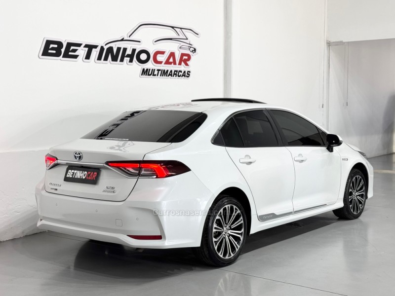 COROLLA 1.8 ALTIS PREMIUM 16V HÍBRIDO 4P AUTOMÁTICO - 2022 - ESTâNCIA VELHA