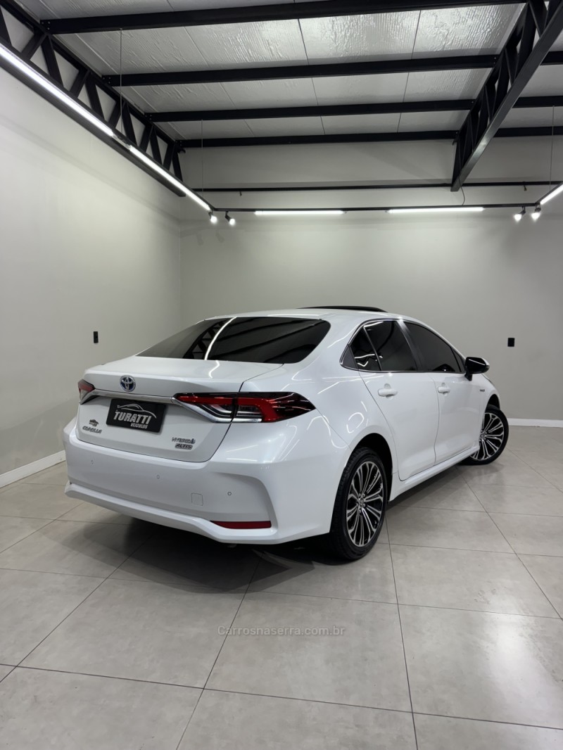 COROLLA 1.8 ALTIS PREMIUM 16V HÍBRIDO 4P AUTOMÁTICO - 2022 - ENCANTADO