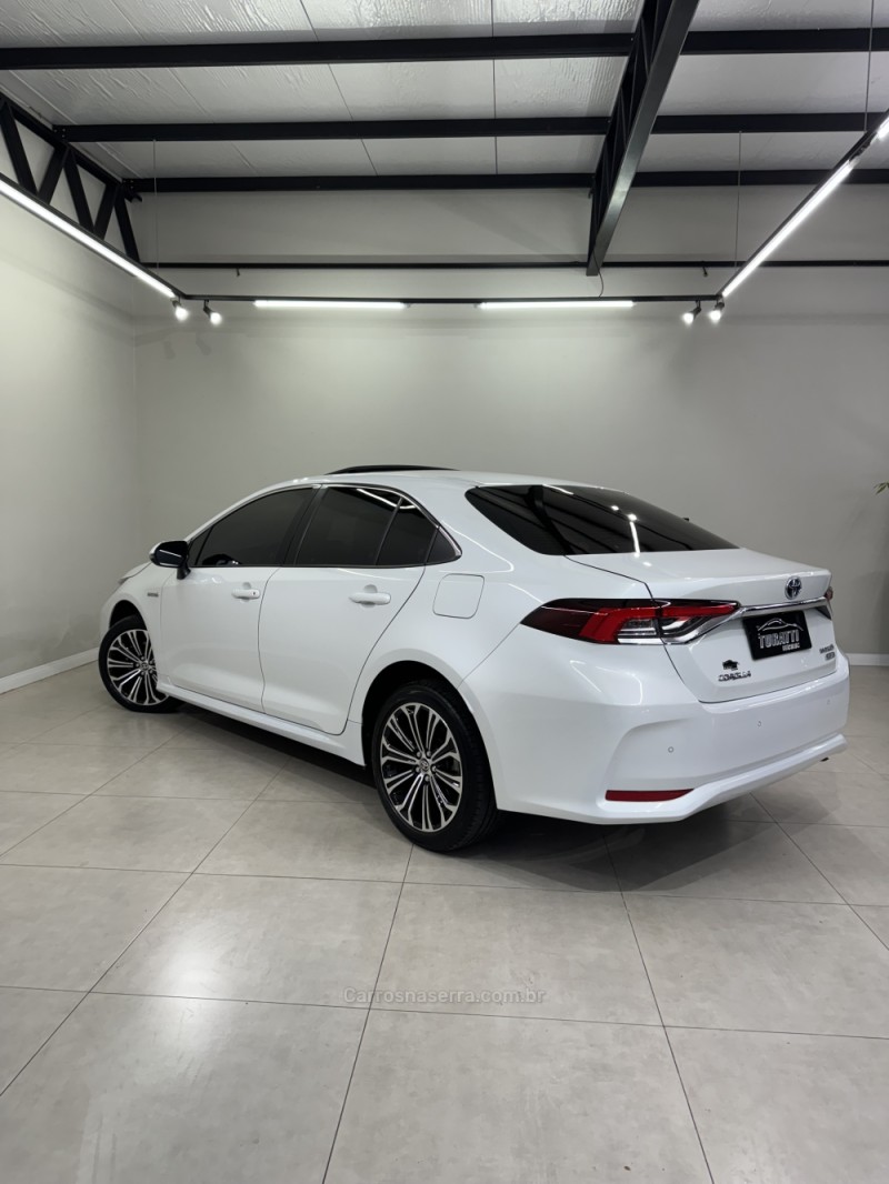 COROLLA 1.8 ALTIS PREMIUM 16V HÍBRIDO 4P AUTOMÁTICO - 2022 - ENCANTADO