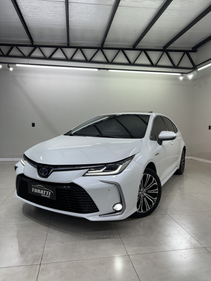 COROLLA 1.8 ALTIS PREMIUM 16V HÍBRIDO 4P AUTOMÁTICO - 2022 - ENCANTADO