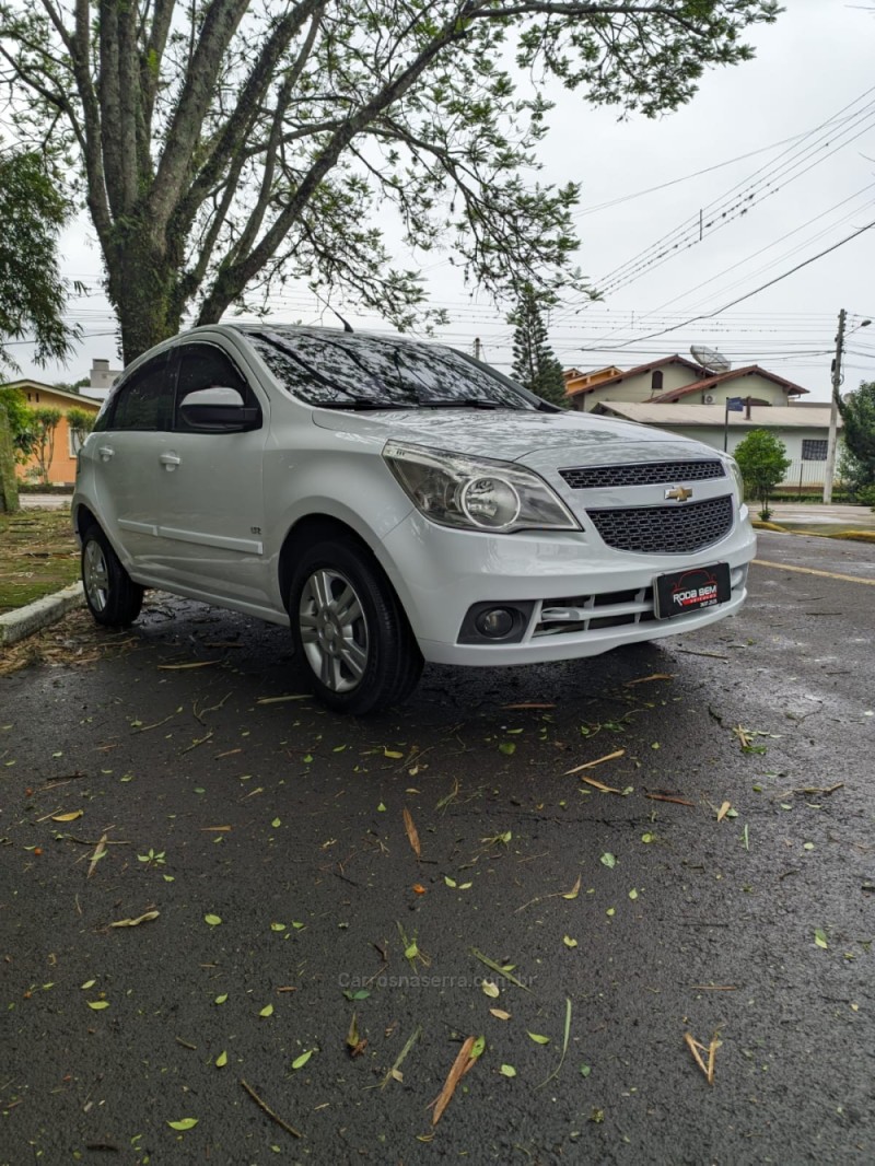 AGILE 1.4 MPFI LTZ 8V FLEX 4P MANUAL - 2011 - FELIZ