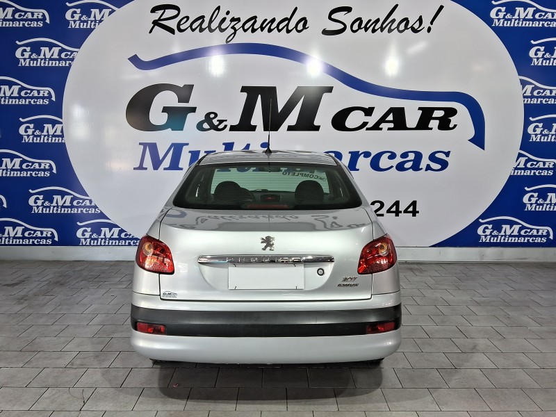 207 1.4 SEDAN XR PASSION 8V FLEX 4P MANUAL - 2010 - SãO SEBASTIãO DO CAí