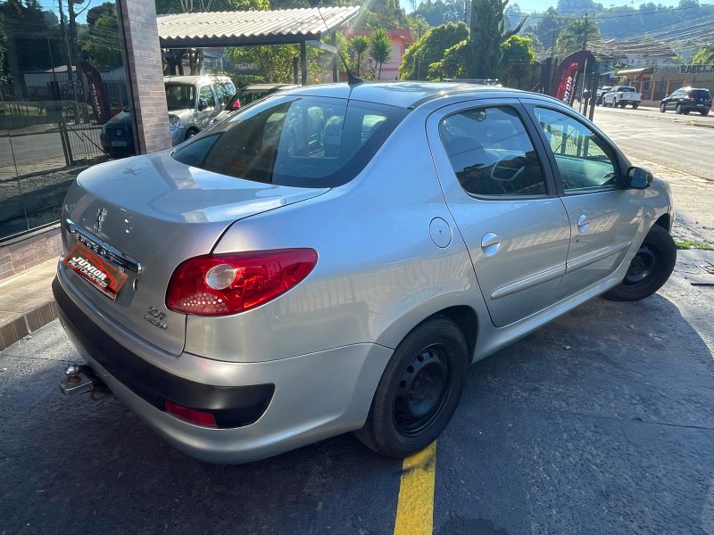 207 1.4 SEDAN XR PASSION 8V FLEX 4P MANUAL - 2010 - CAXIAS DO SUL