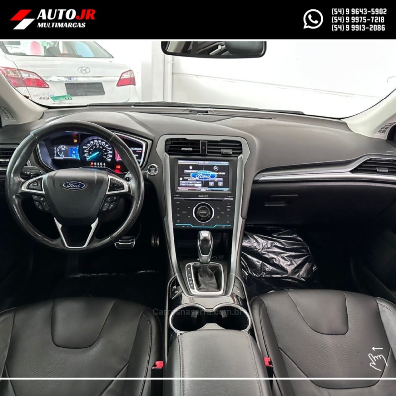 FUSION 2.0 TITANIUM AWD 16V GASOLINA 4P AUTOMÁTICO - 2013 - VACARIA