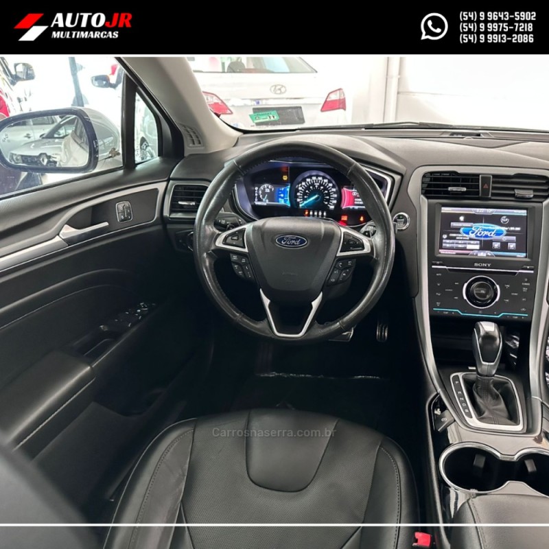 FUSION 2.0 TITANIUM AWD 16V GASOLINA 4P AUTOMÁTICO - 2013 - VACARIA