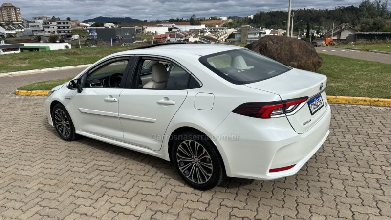 COROLLA 1.8 ALTIS PREMIUM 16V HÍBRIDO 4P AUTOMÁTICO - 2021 - LAJEADO