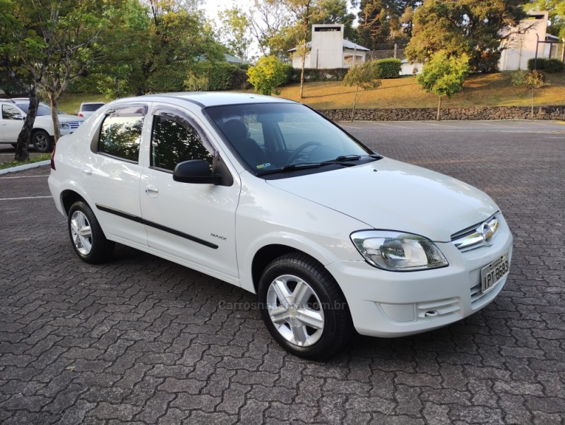 PRISMA 1.0 MPFI VHCE MAXX 8V FLEX 4P MANUAL - 2009 - CAXIAS DO SUL