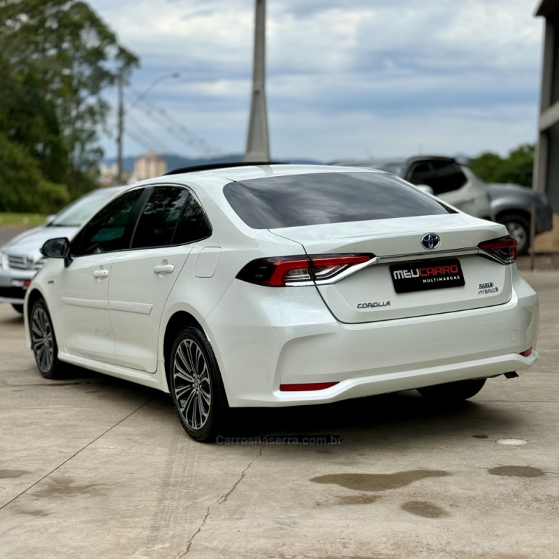 COROLLA 1.8 ALTIS PREMIUM 16V HÍBRIDO 4P AUTOMÁTICO - 2021 - LAJEADO