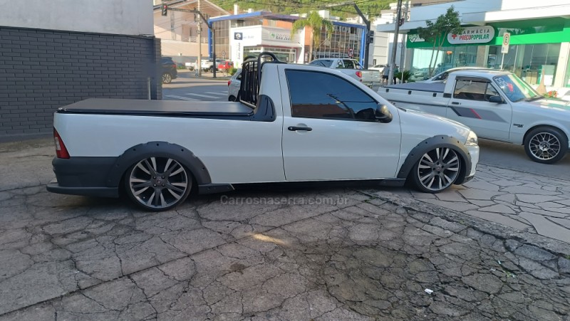 STRADA 1.4 MPI HARD WORKING CE 8V FLEX 2P MANUAL - 2013 - FLORES DA CUNHA