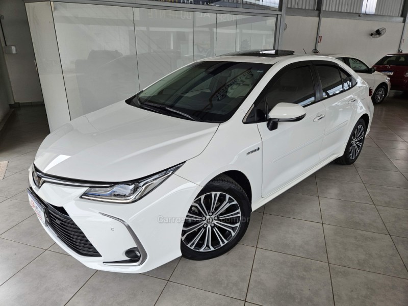 COROLLA 1.8 ALTIS PREMIUM 16V HÍBRIDO 4P AUTOMÁTICO - 2021 - TAPEJARA