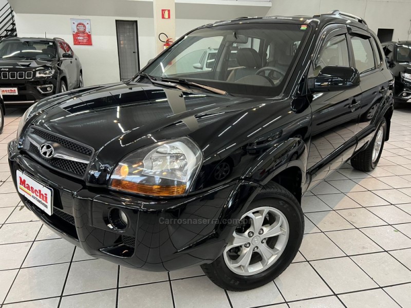 tucson 2.0 mpfi gls 16v 143cv 2wd gasolina 4p automatico 2013 caxias do sul