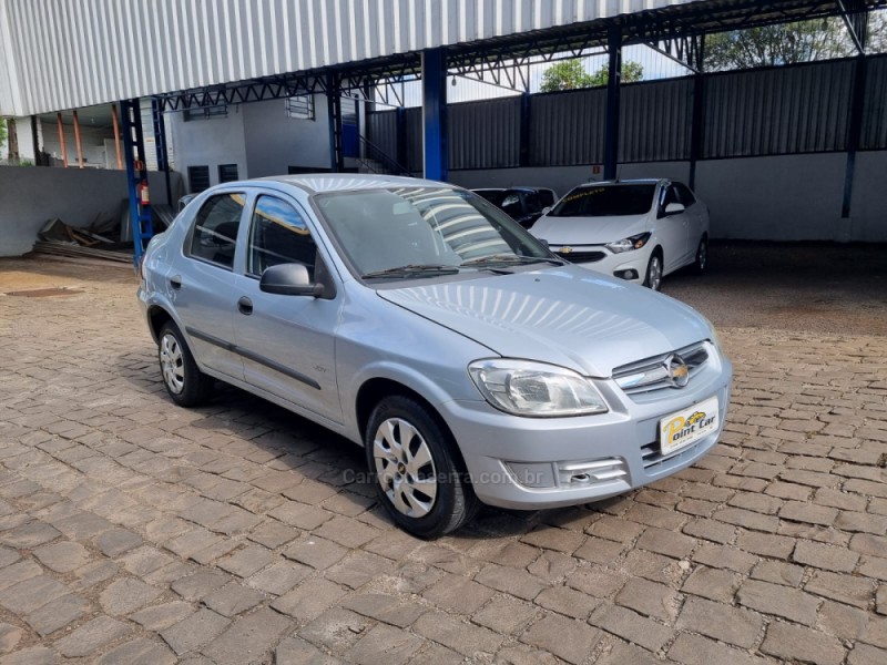 prisma 1.4 mpfi joy 8v flex 4p manual 2010 vacaria