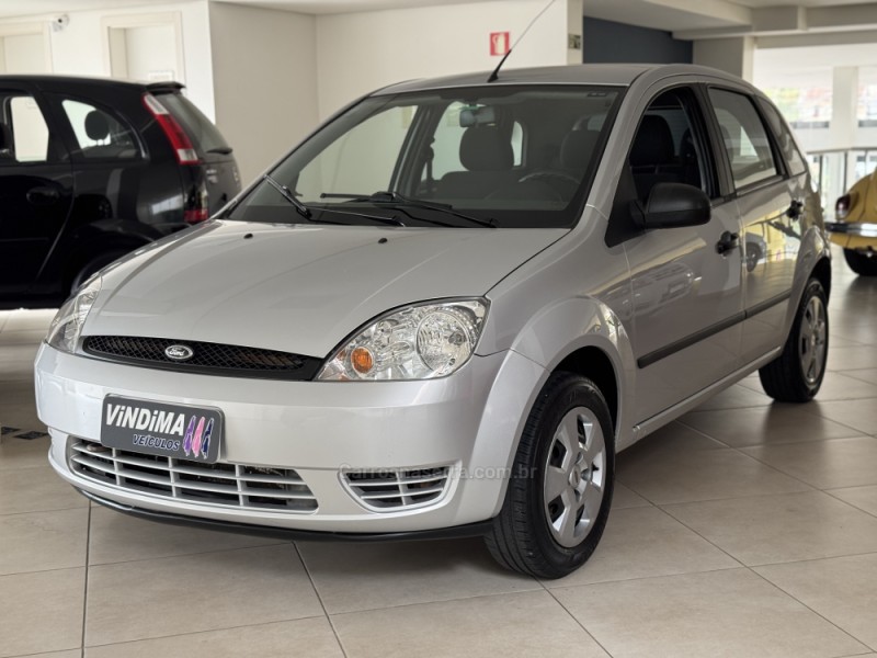 FIESTA 1.6 ROCAM HATCH 8V FLEX 4P MANUAL - 2006 - FLORES DA CUNHA