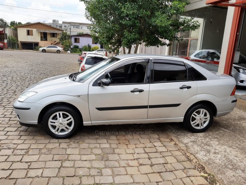 focus 2.0 ghia sedan 16v flex 4p manual 2008 guapore