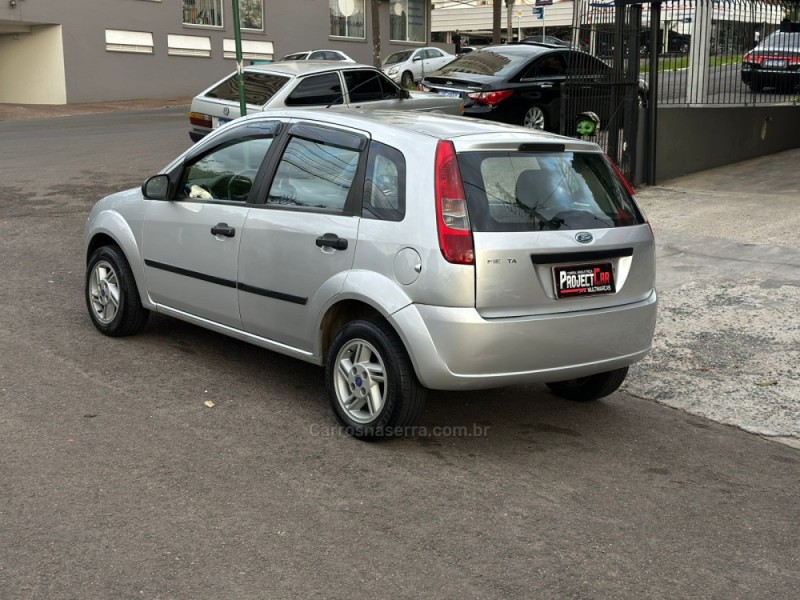 FIESTA 1.0 MPI PERSONNALITÉ 8V FLEX 4P MANUAL - 2005 - NOVO HAMBURGO