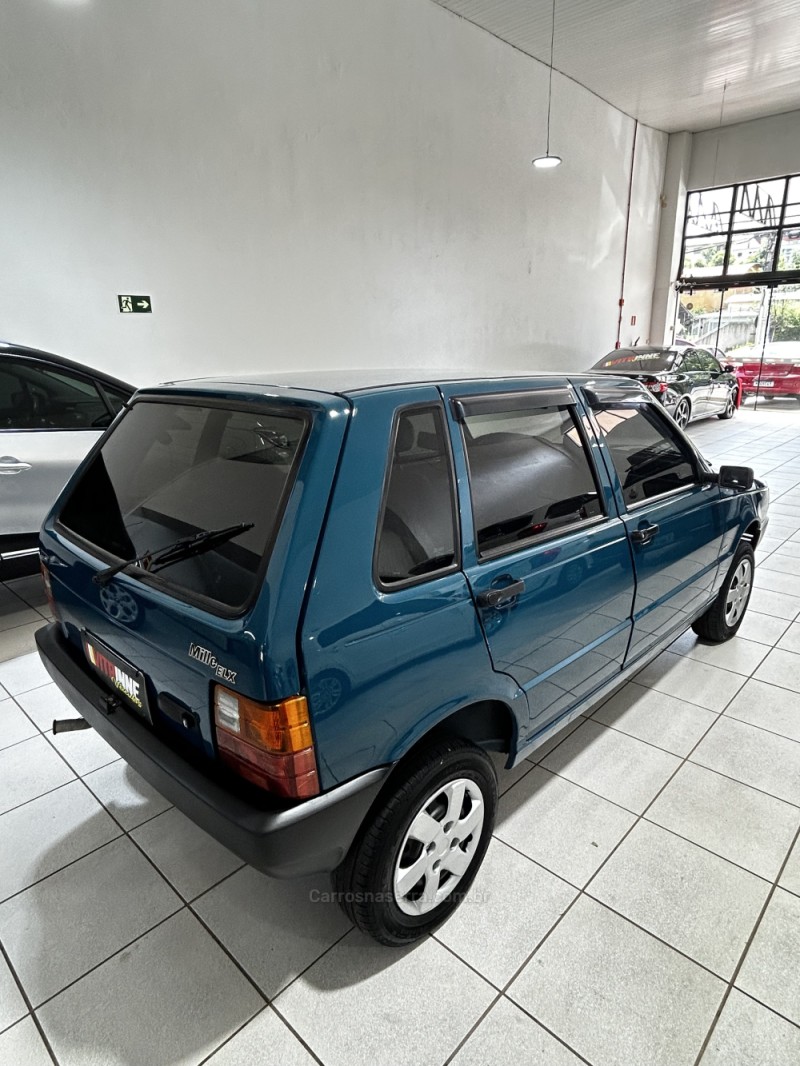 UNO 1.0 MILLE ELETRONIC 8V GASOLINA 4P MANUAL - 1994 - CAXIAS DO SUL