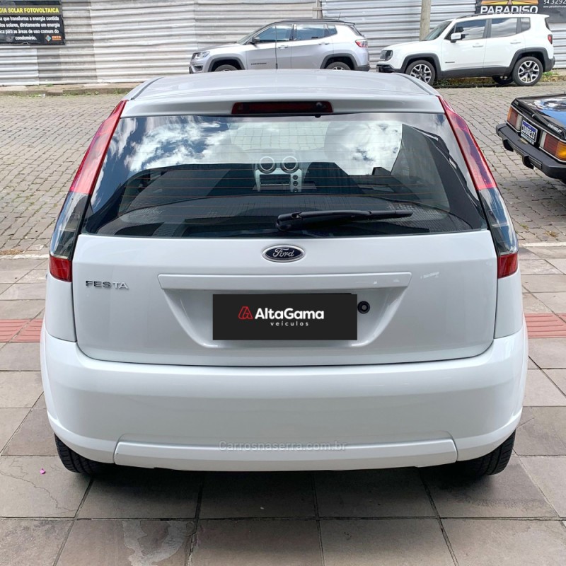 FIESTA 1.0 ROCAM HATCH 8V FLEX 4P MANUAL - 2014 - FLORES DA CUNHA