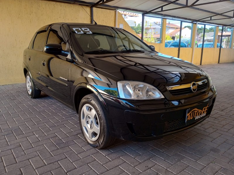 corsa 1.4 mpfi premium sedan 8v flex 4p manual 2009 canela