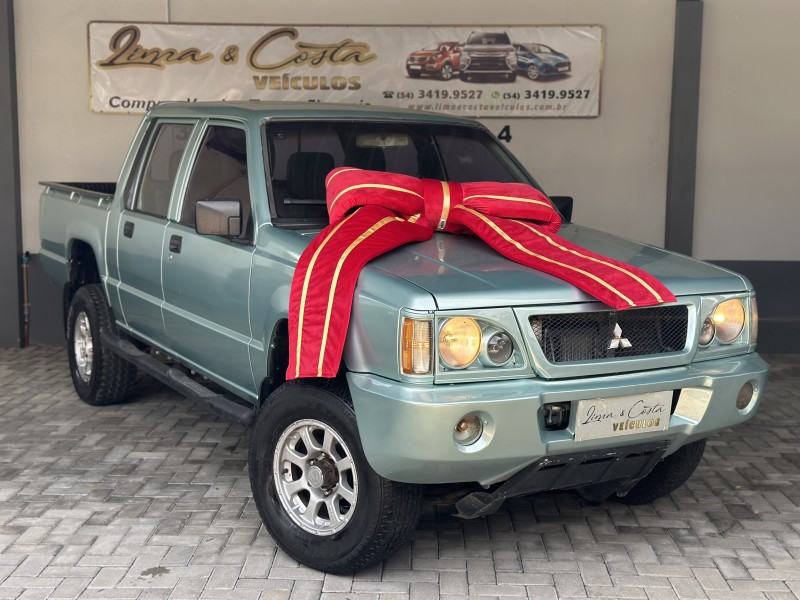 l200 2.5 gls 4x4 cd 8v diesel 4p manual  2002 caxias do sul