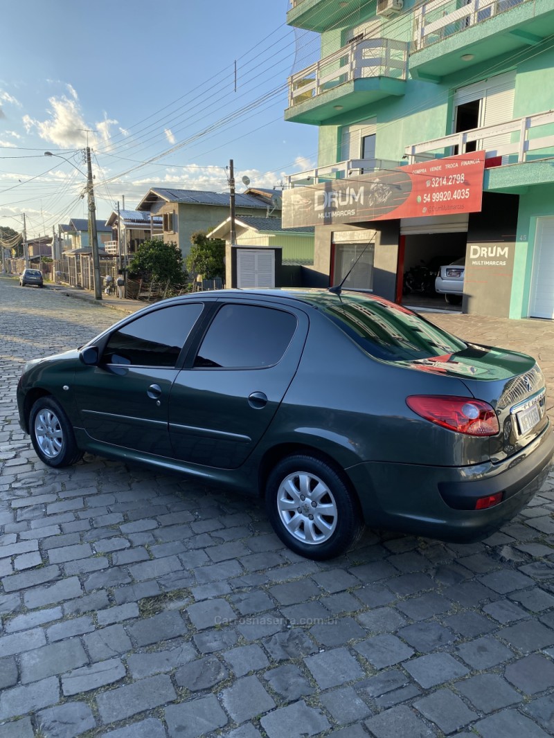 207 1.4 SEDAN XR PASSION 8V FLEX 4P MANUAL - 2010 - CAXIAS DO SUL