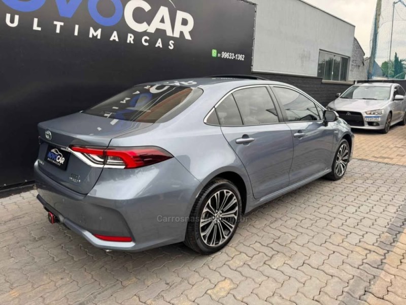 COROLLA 1.8 ALTIS PREMIUM 16V HÍBRIDO 4P AUTOMÁTICO - 2023 - ESTâNCIA VELHA