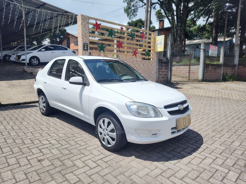 PRISMA 1.4 MPFI MAXX 8V FLEX 4P MANUAL - 2012 - CANELA