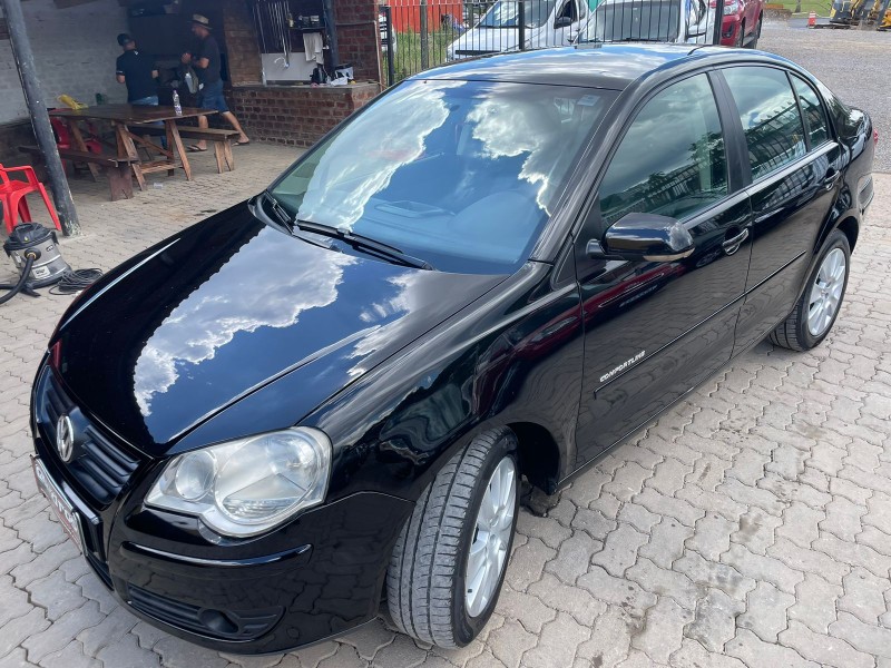 POLO SEDAN 1.6 MI COMFORTLINE 8V FLEX 4P MANUAL - 2012 - CAXIAS DO SUL