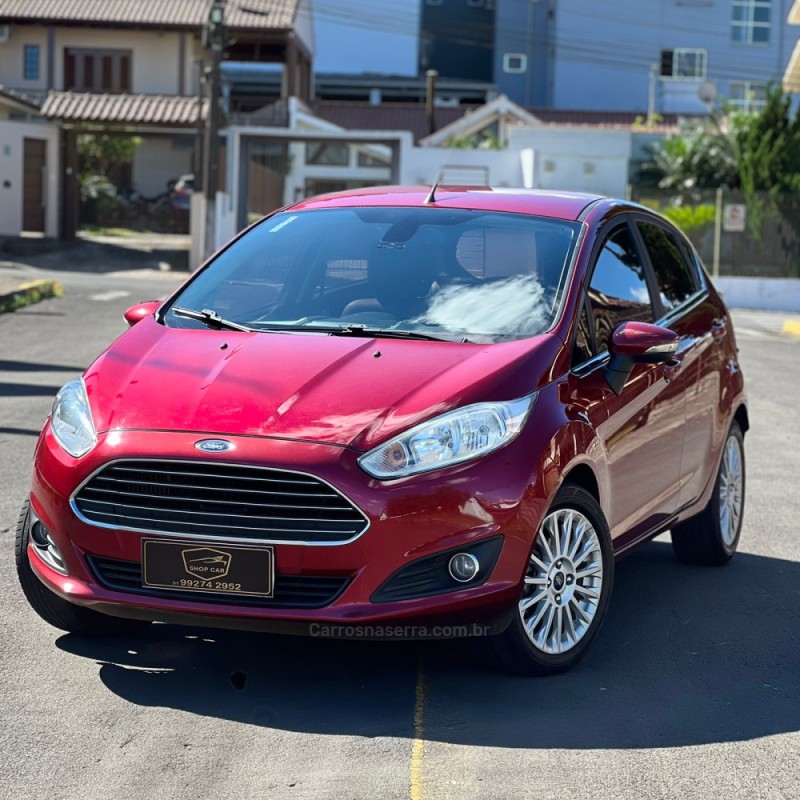 FIESTA 1.0 ECOBOOST TITANIUM PLUS HATCH 12V GASOLINA 4P AUTOMÁTICO - 2017 - MONTENEGRO