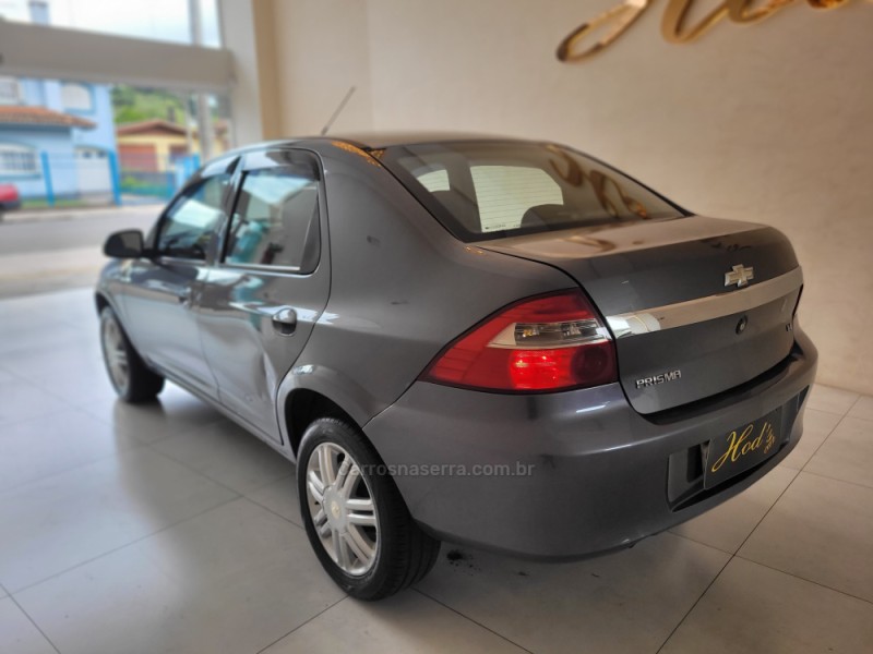 PRISMA 1.4 MPFI LT 8V FLEX 4P MANUAL - 2012 - CANELA