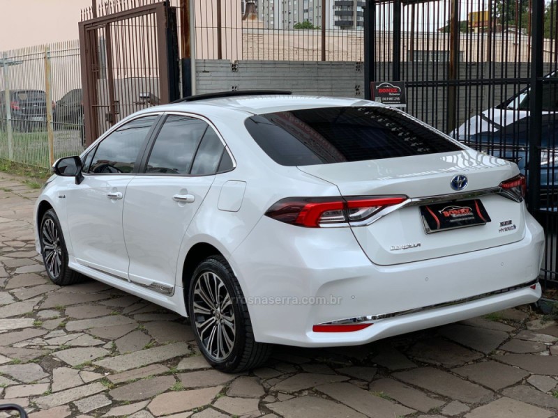 COROLLA 1.8 ALTIS PREMIUM 16V HÍBRIDO 4P AUTOMÁTICO - 2023 - CAXIAS DO SUL