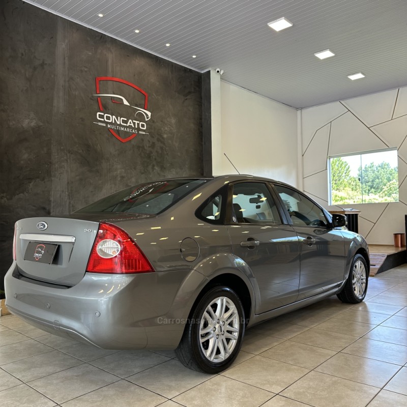 FOCUS 2.0 GHIA SEDAN 16V FLEX 4P MANUAL - 2009 - FARROUPILHA