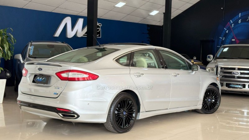 FUSION 2.0 TITANIUM AWD 16V GASOLINA 4P AUTOMÁTICO - 2013 - ESTâNCIA VELHA