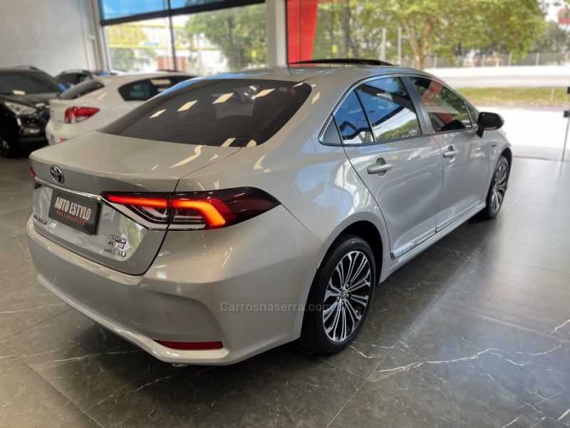 COROLLA 1.8 ALTIS PREMIUM 16V HÍBRIDO 4P AUTOMÁTICO - 2023 - ESTâNCIA VELHA