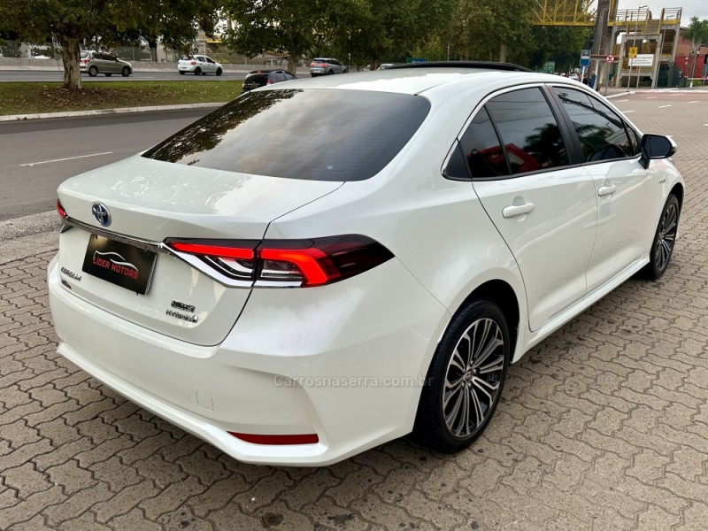 COROLLA 1.8 ALTIS PREMIUM 16V HÍBRIDO 4P AUTOMÁTICO - 2021 - ESTâNCIA VELHA