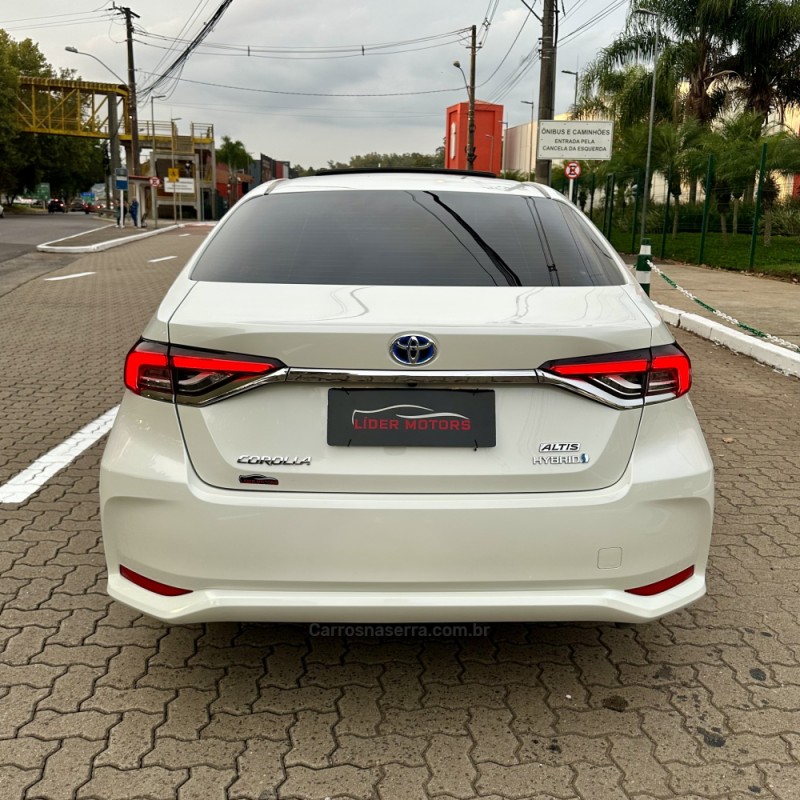 COROLLA 1.8 ALTIS PREMIUM 16V HÍBRIDO 4P AUTOMÁTICO - 2021 - ESTâNCIA VELHA
