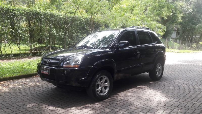 tucson 2.0 mpfi gls 16v 143cv 2wd gasolina 4p automatico 2013 canela