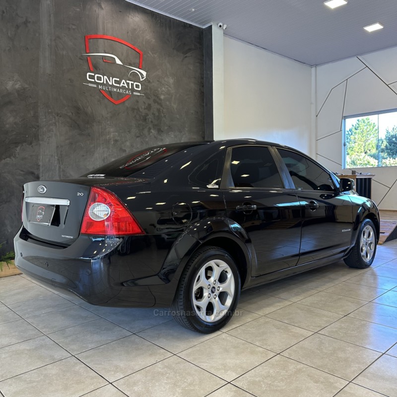 FOCUS 2.0 TITANIUM SEDAN 16V FLEX 4P AUTOMÁTICO - 2011 - FARROUPILHA