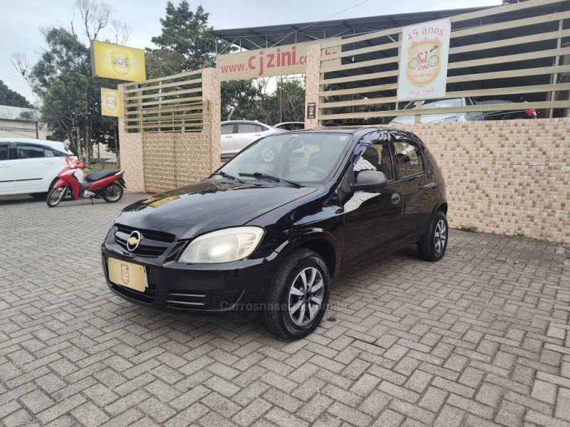 celta 1.0 mpfi spirit 8v flex 4p manual 2010 canela
