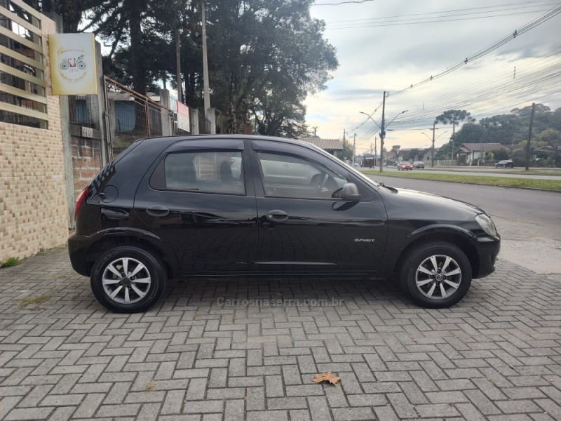 CELTA 1.0 MPFI SPIRIT 8V FLEX 4P MANUAL - 2010 - CANELA